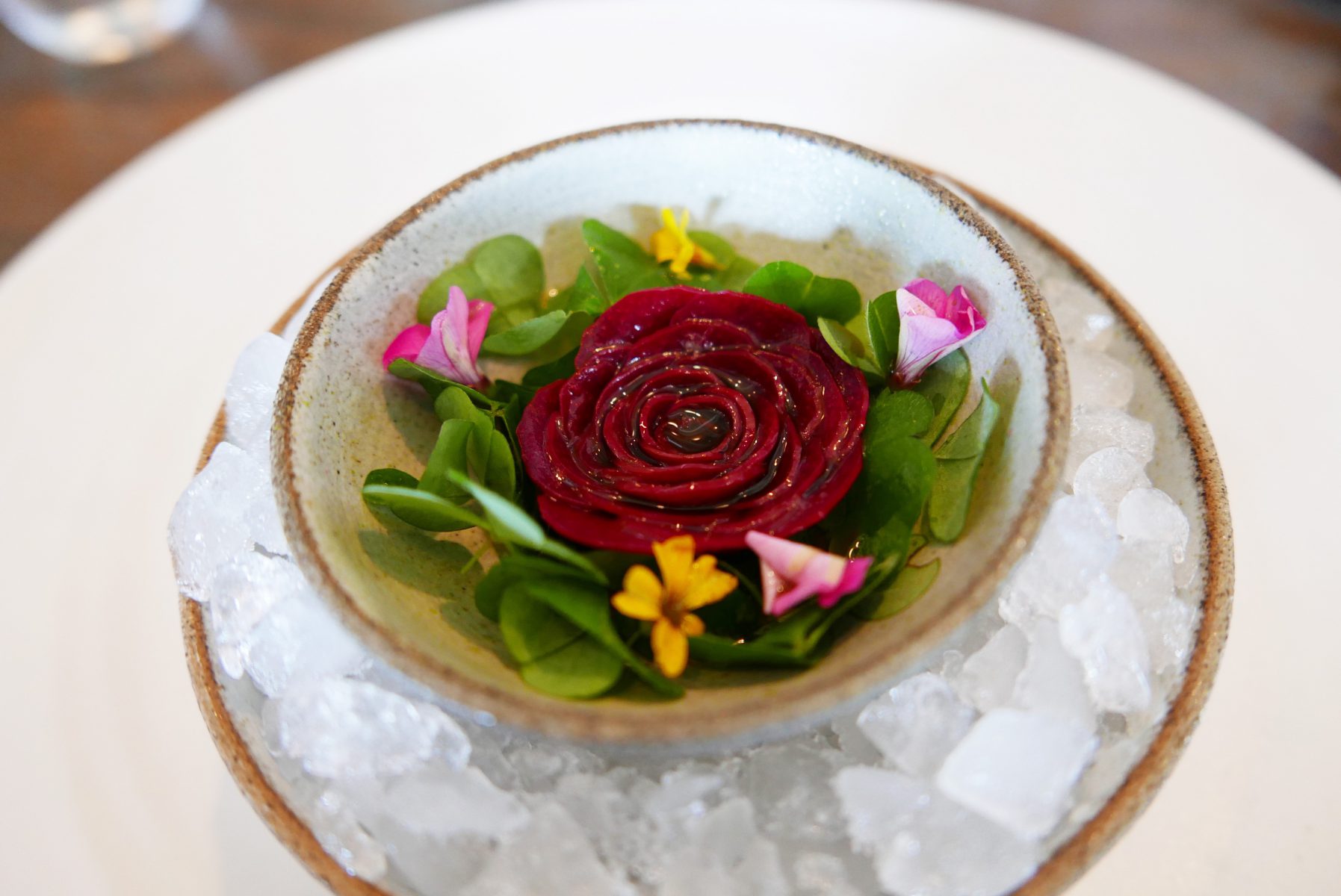 Radish pie with reduced cucumber juice, coriander paste and seaweed pastry crust.