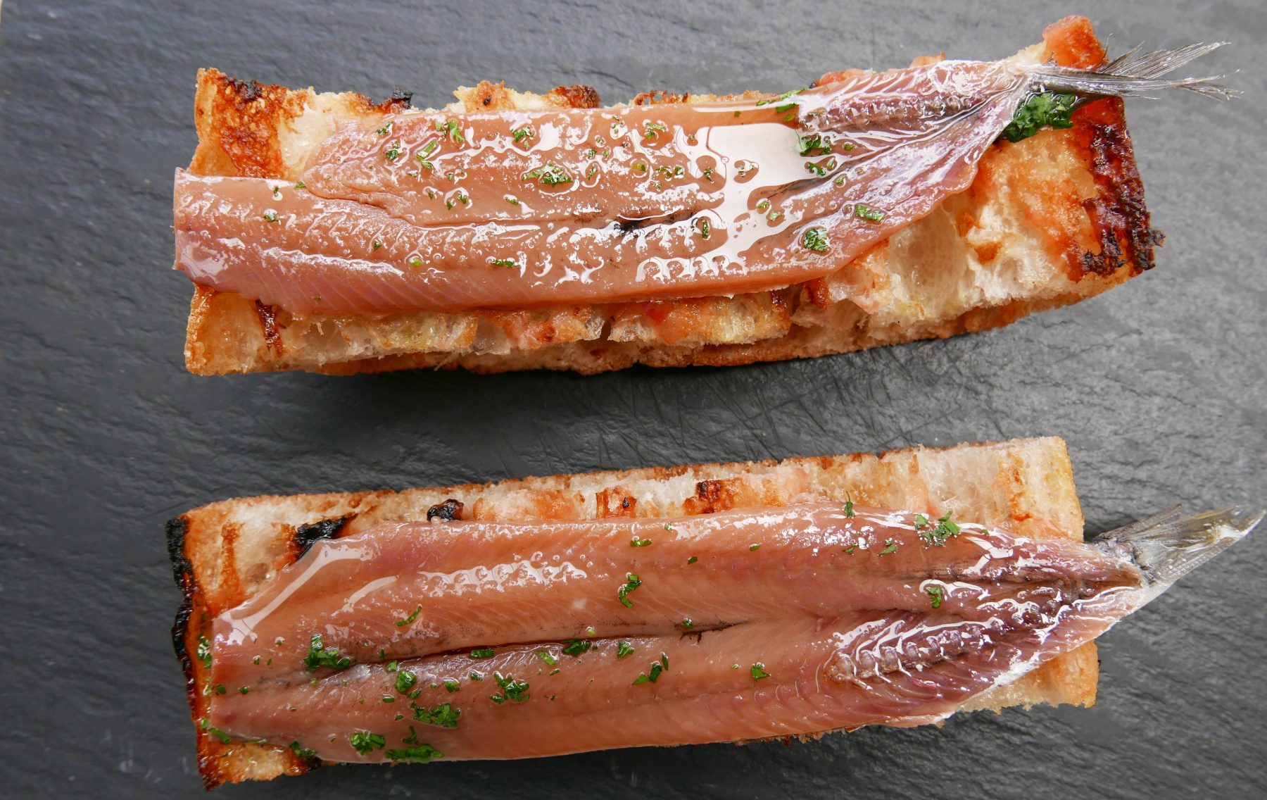 Salted anchovy with toasted bread