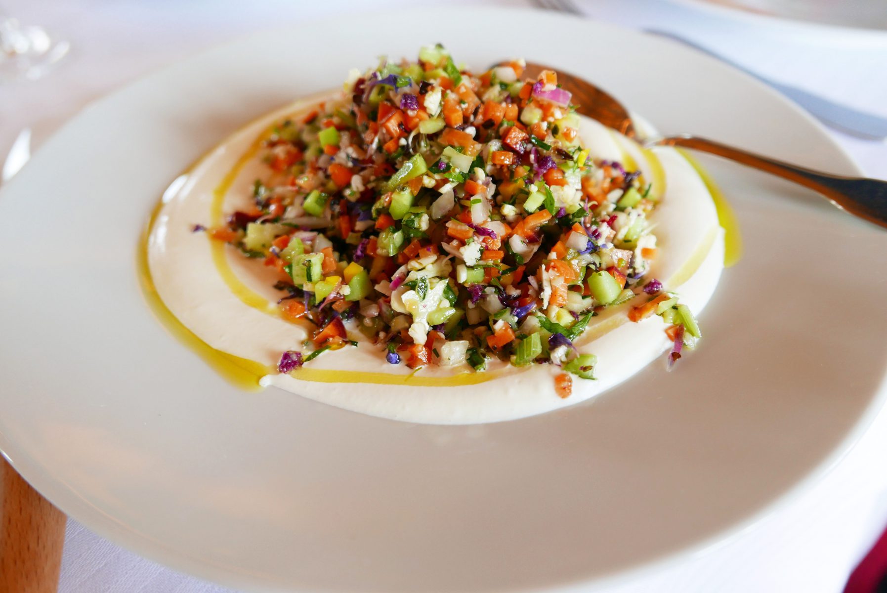 Chopped vegetables with cream and olive oil