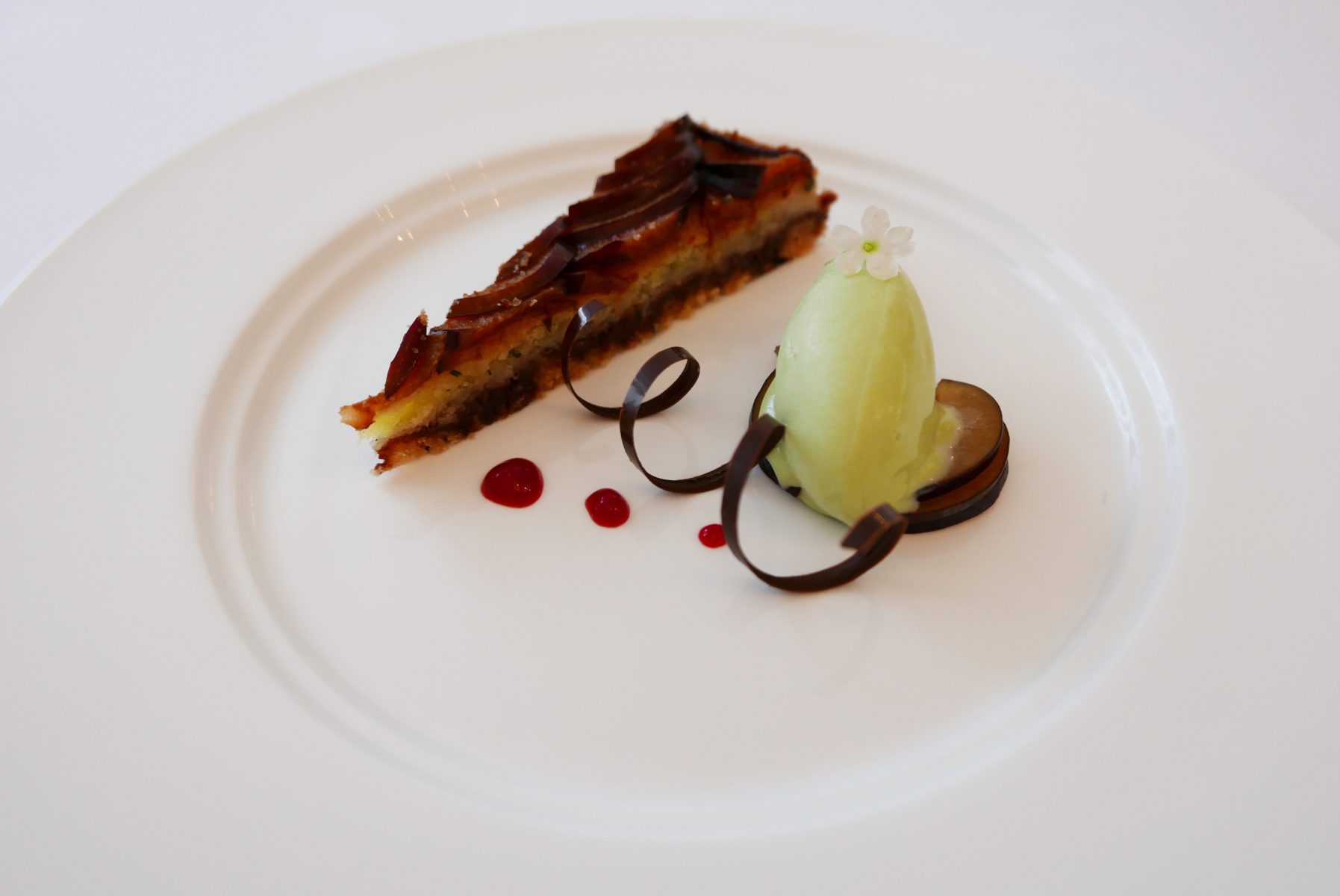 Plum tart with thyme ice cream