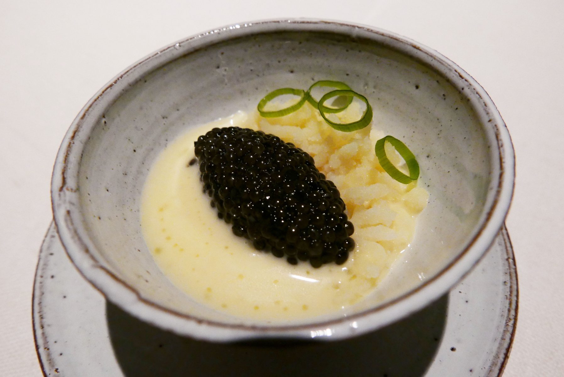 Pressed and creamed potato with oscietra caviar, smoked bacon butter and vichyssoise at Frantzen in Stockholm in August
