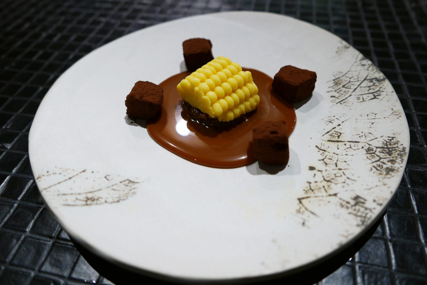 Corn ice cream,peanuts praliné biscuit,chocolate and dulce de leche at Hoja Santa in Barcelona, September