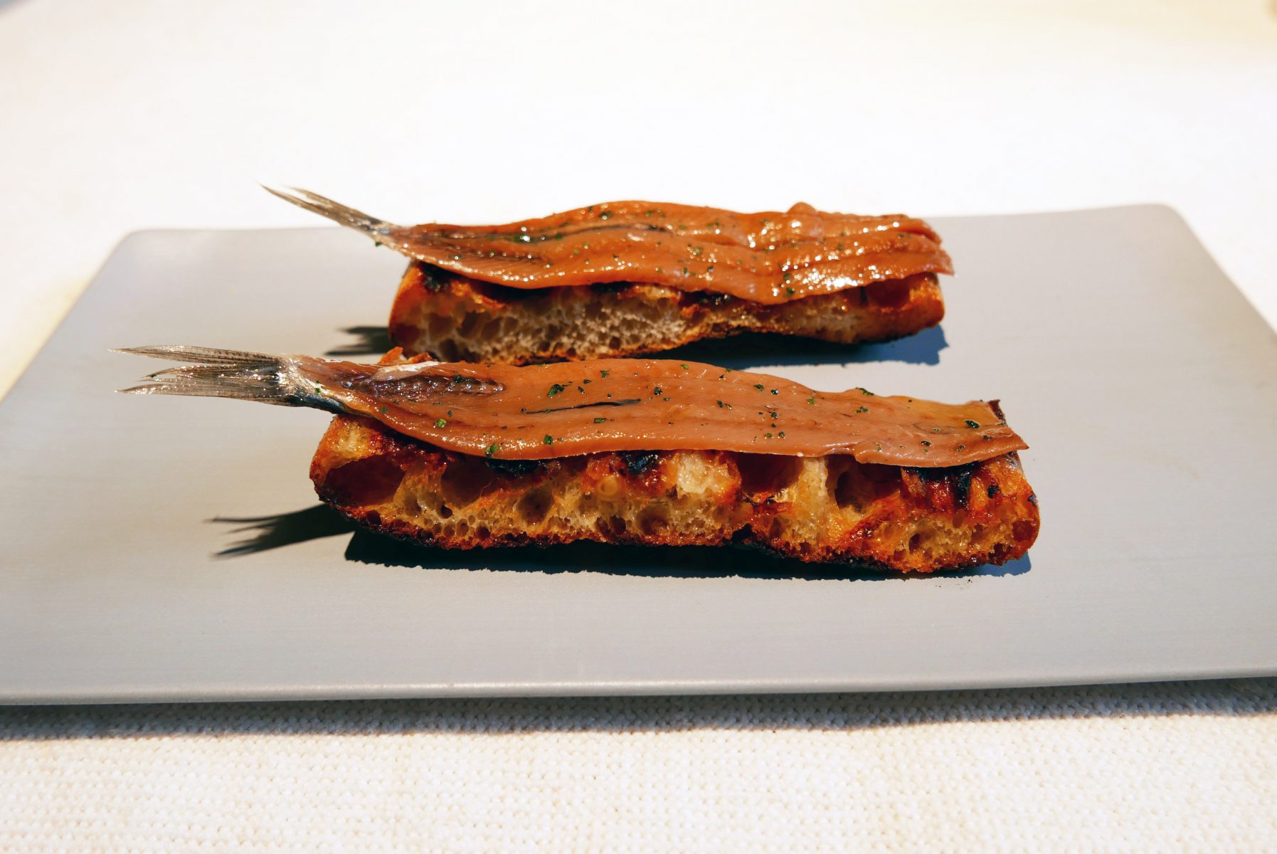 Salted anchovy with toasted bread