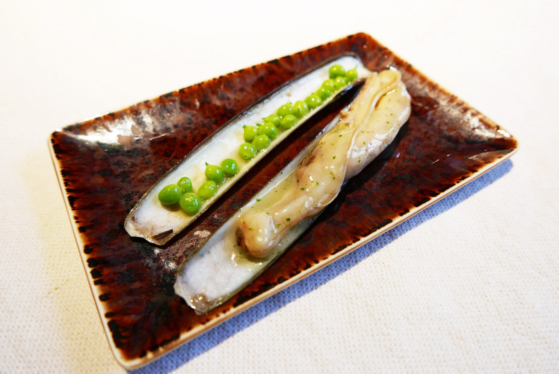 Razor clam with "tear drop" peas