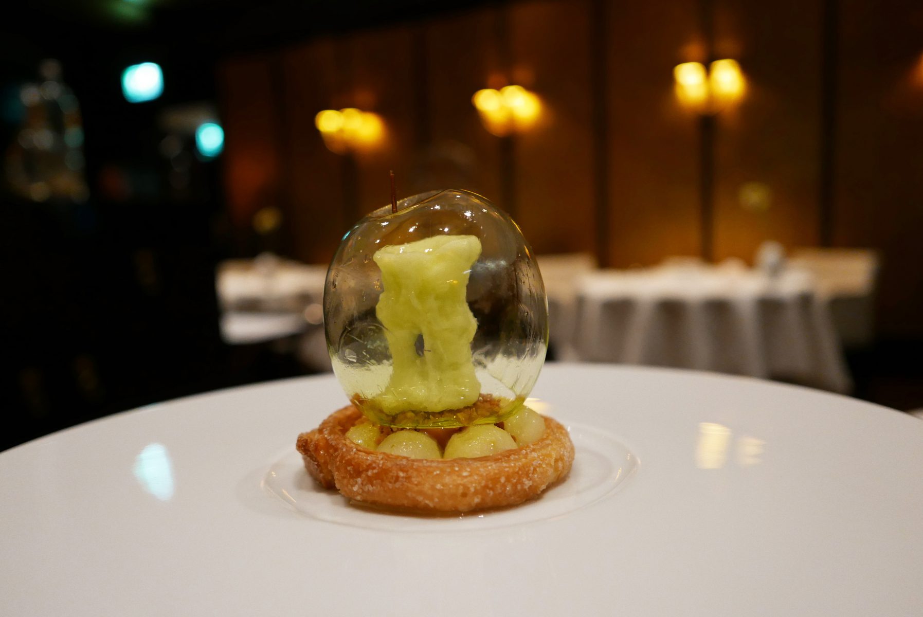 Signature sugar apple with apple sorbet, puff pastry with salted caramel and lemon verbena marinated apples