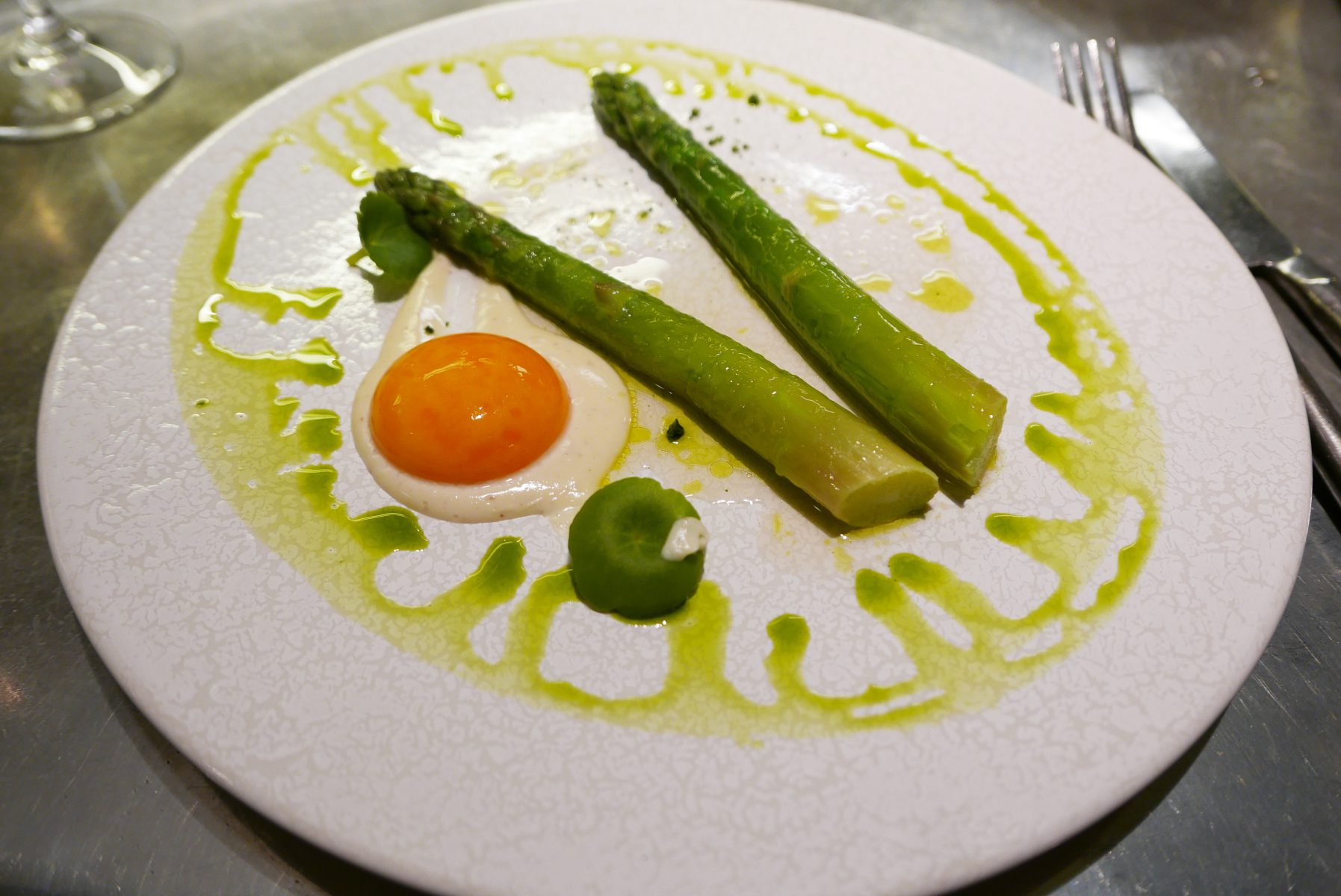 Green asparagus with salt cured egg yolk and parmesan cheese sauce