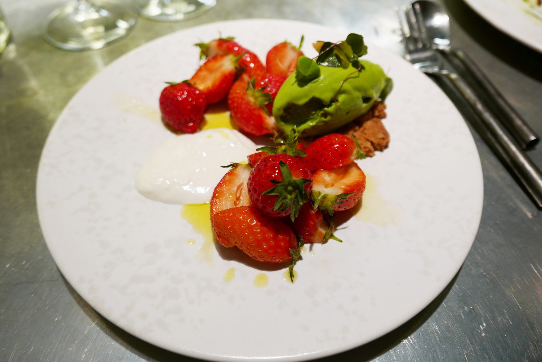 First strawberries with lovage ice cream