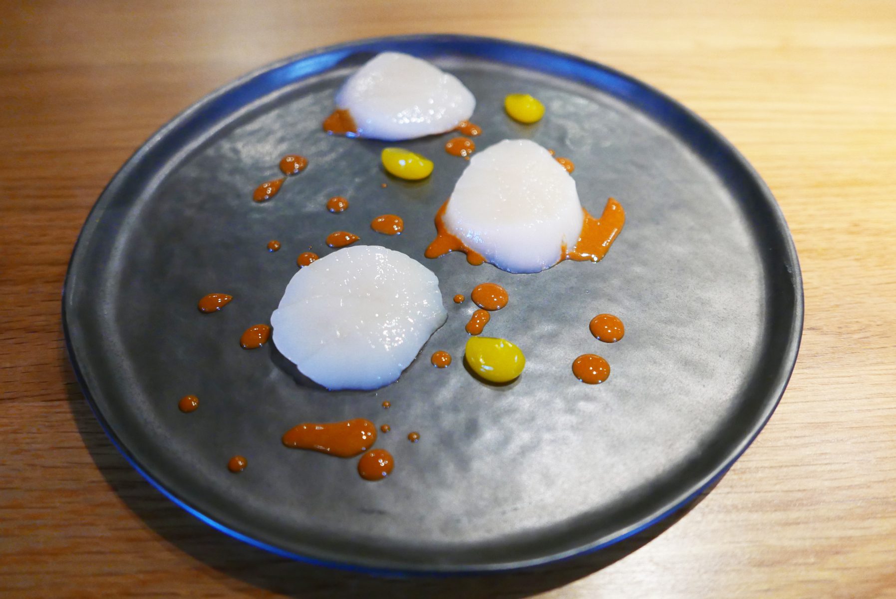 Live scallops from Isle of Mull ( still moving when touched with a fork) with sea urchin and coffee cream,shiro dashi. Mikael always outsources the best scallops one can get.