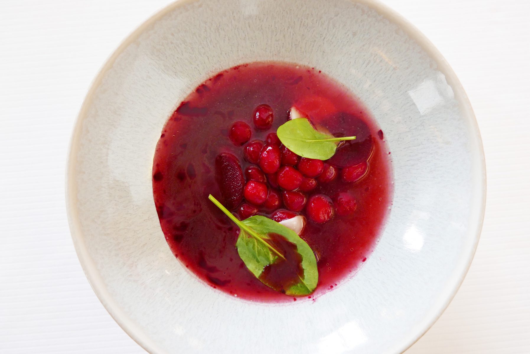 Parsnip and beetroot moelleux, vegetables consommé with horseradish and old Beaufort