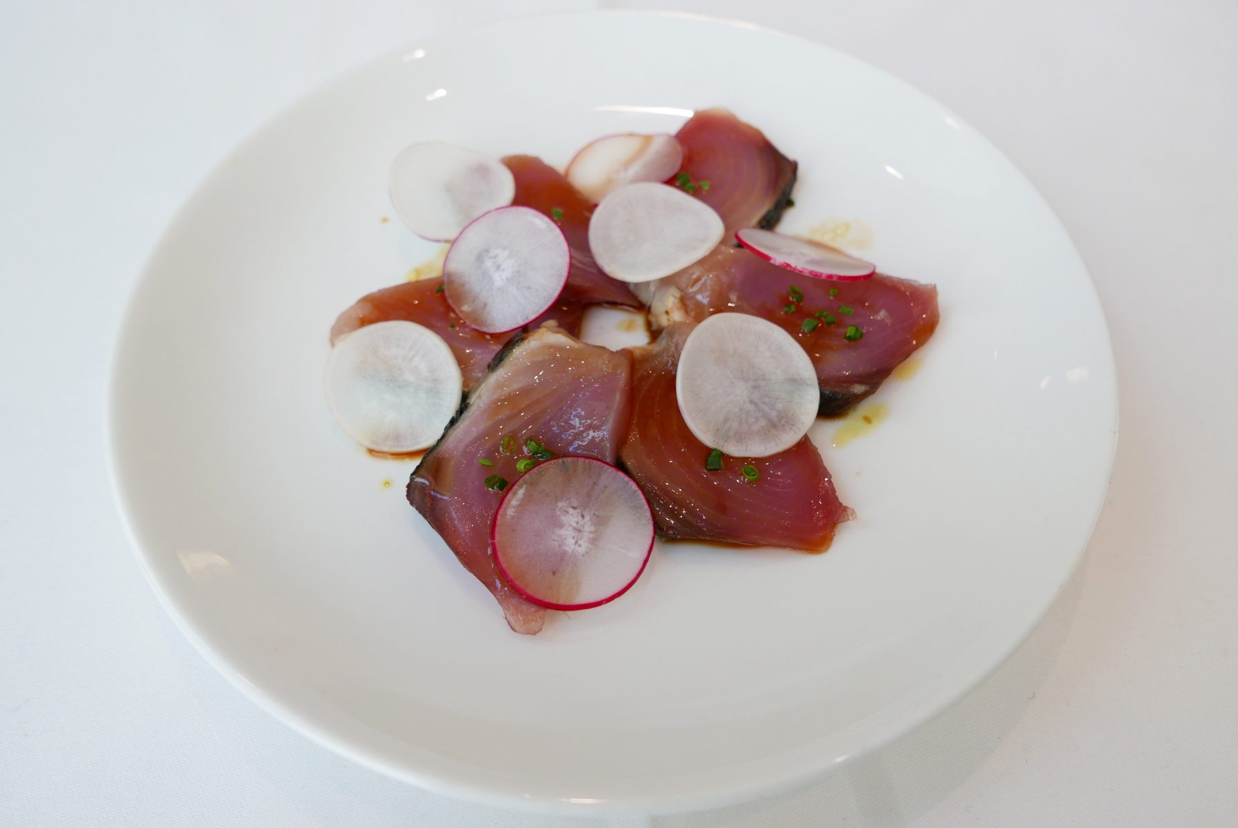 Bonito sashimi with turnip, radish,soy and olive oil dressing