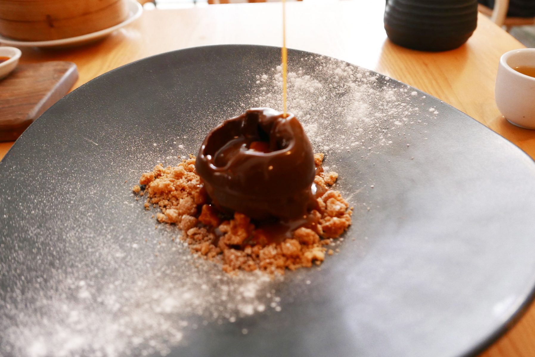 Tea smoked banana,nut crumble, chocolate and caramel