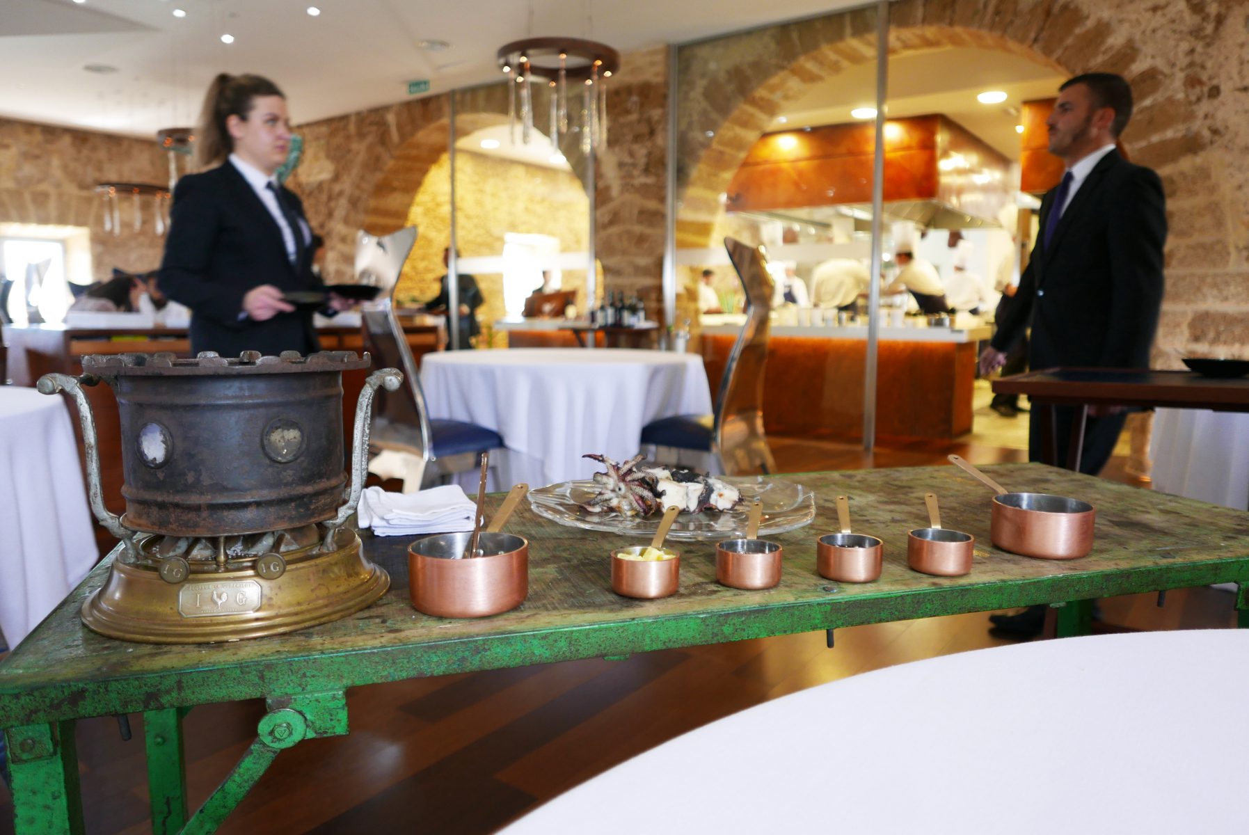 Cuttlefish à la presse. Although the ritual was impressive to watch, the final result didn't taste anything more than potato dumpling with cuttlefish ink.