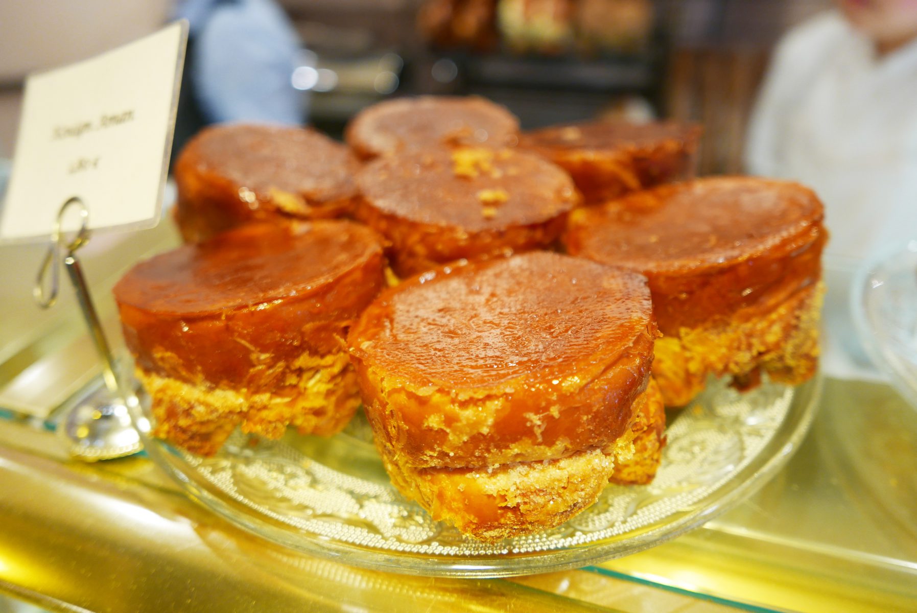 Kouign-amanns at "Au Chant du Coq" bakery in Versailles.