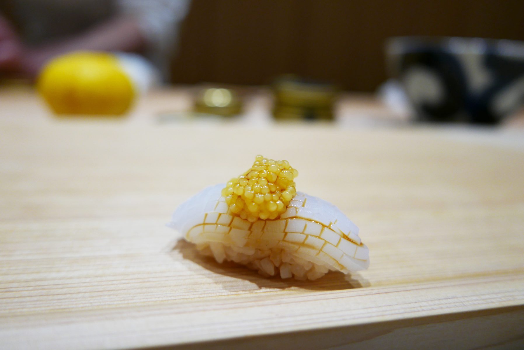 Squid sushi with golden Almas caviar at The Araki