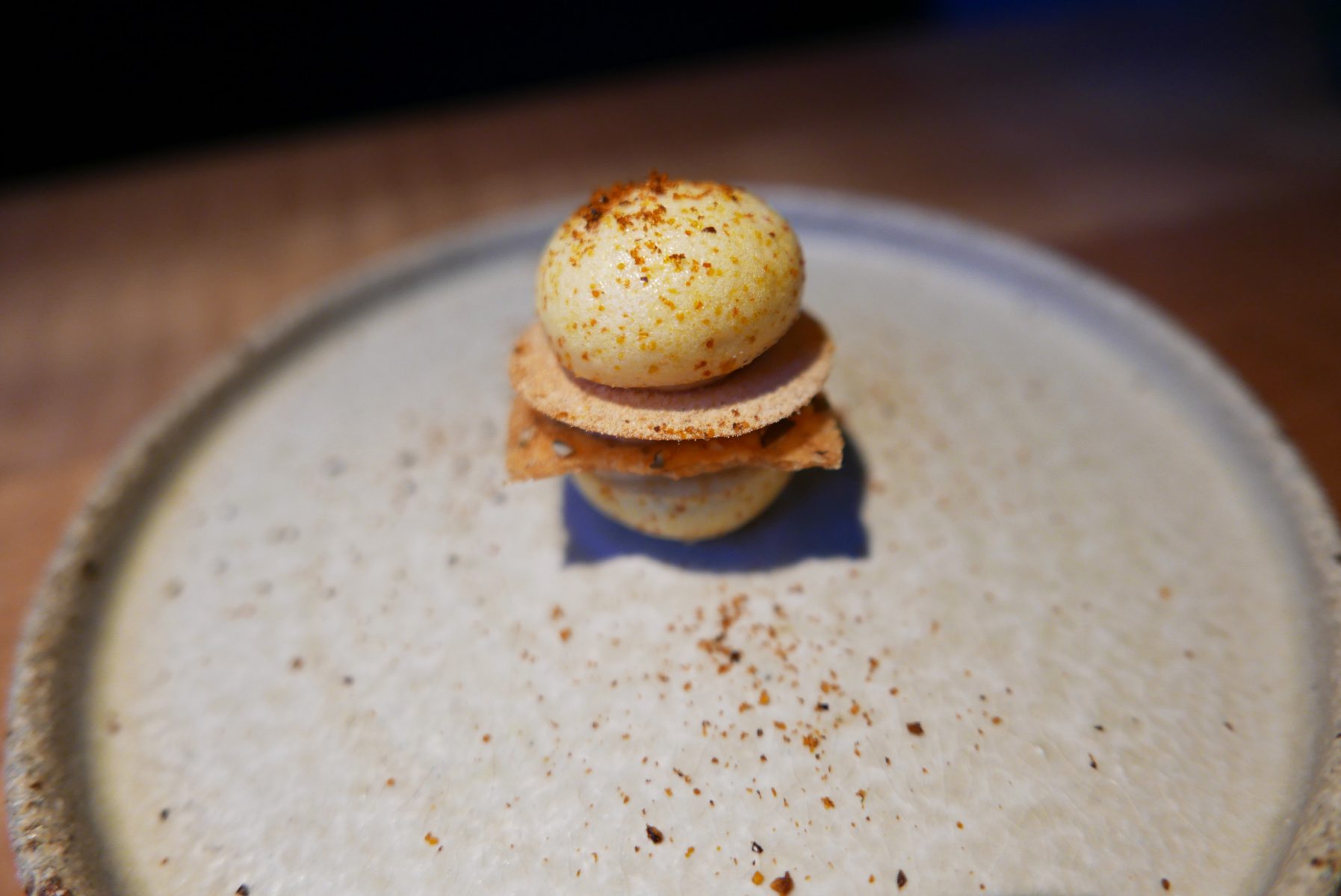 Macaron: pumpkin, foie gras orange, sea buckthorn, toasted oats and green peppercorns