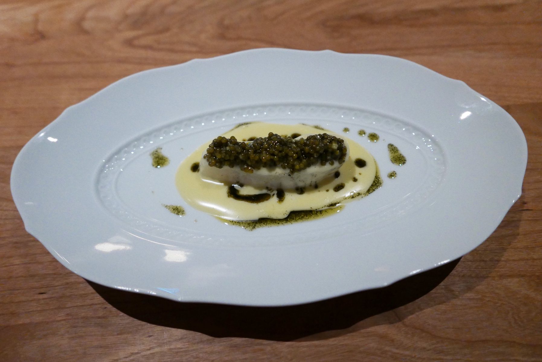 Baked wild turbot,fermented white asparagus juice,Frantzén "reserve caviar"& beurre noisette with toasted seaweed