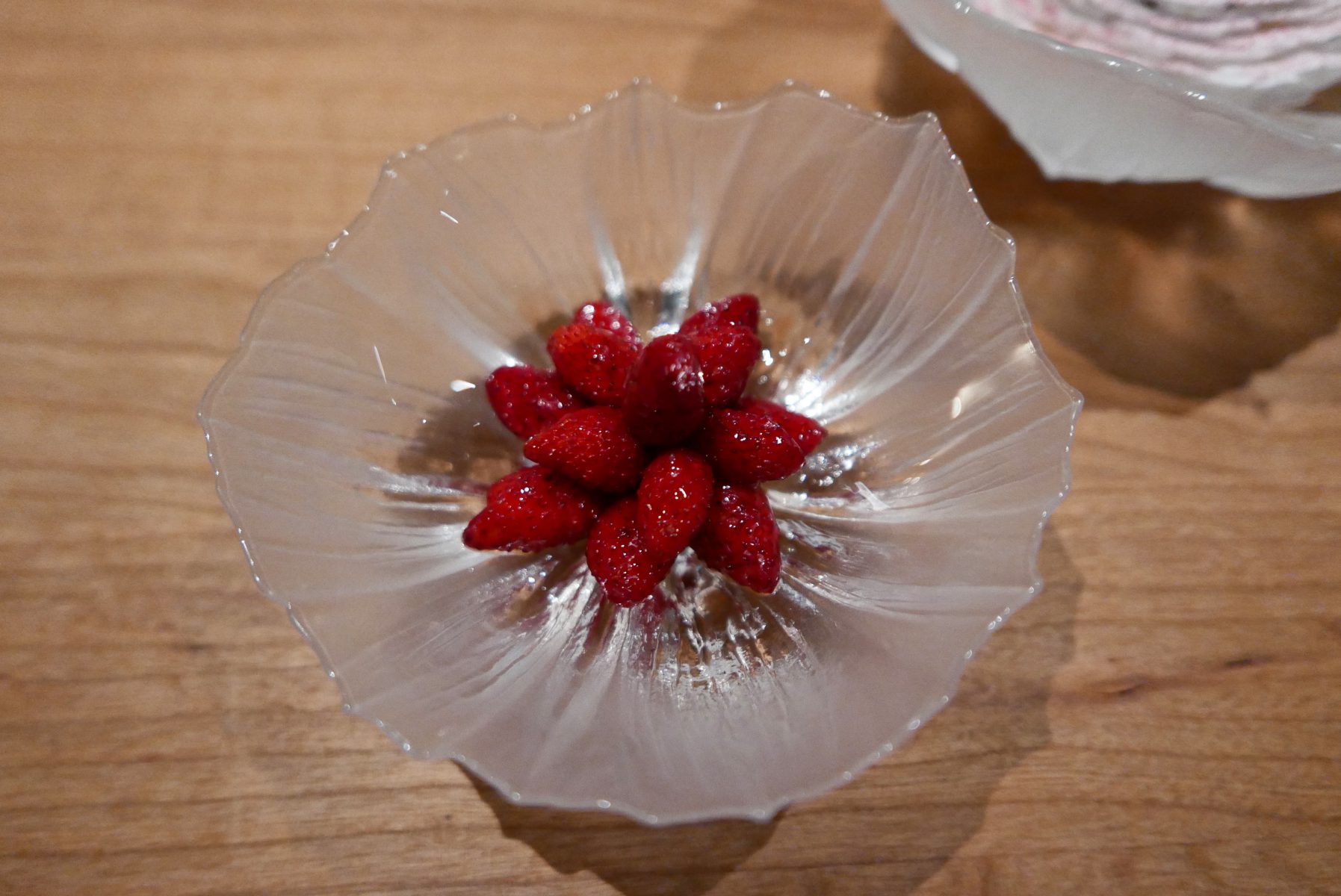 Sichuan pepper glazed wild strawberries,dried yoghurt meringue,birch tree oil&raw buffalo milk ice cream