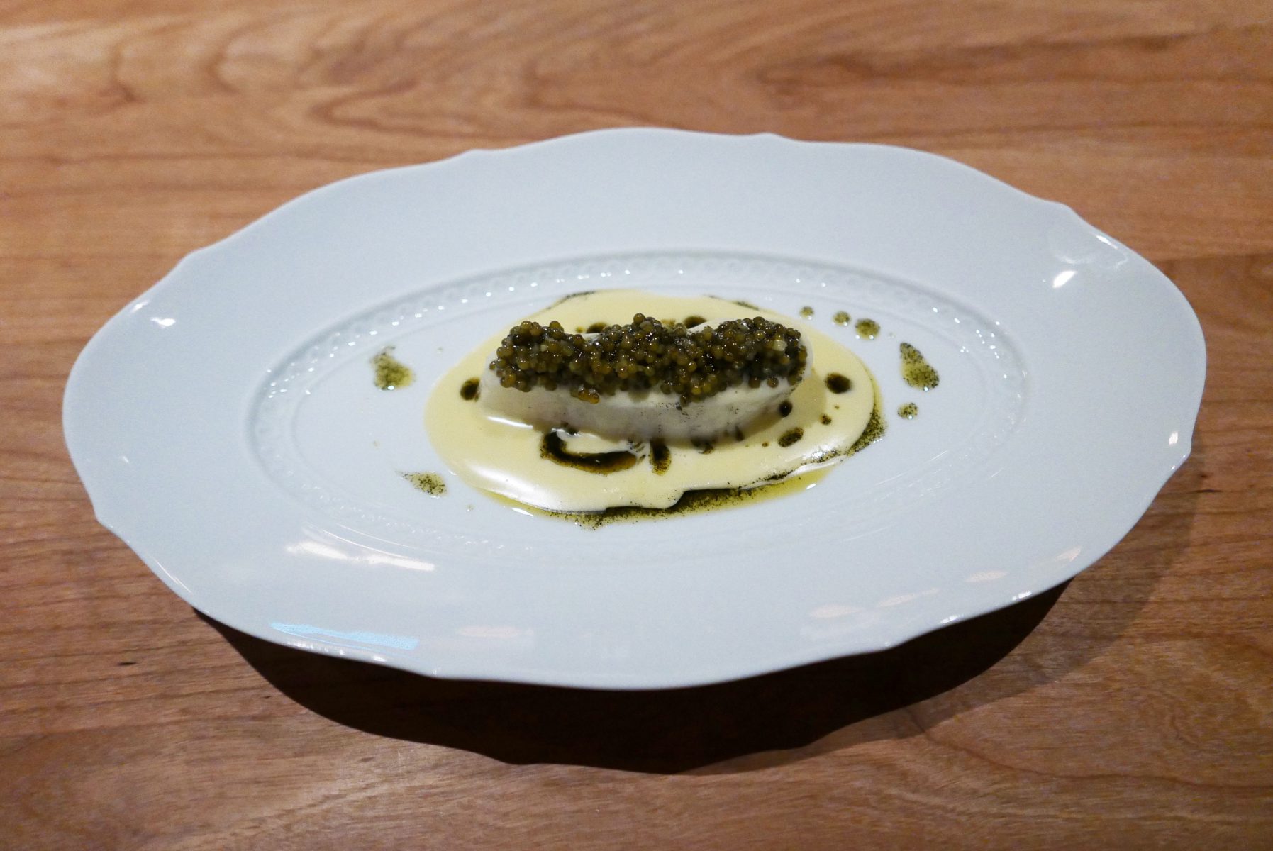 Baked wild turbot, fermented wild asparagus juice,Rossini caviar,beurre noisette with toasted seaweed at Frantzén, Stockholm.