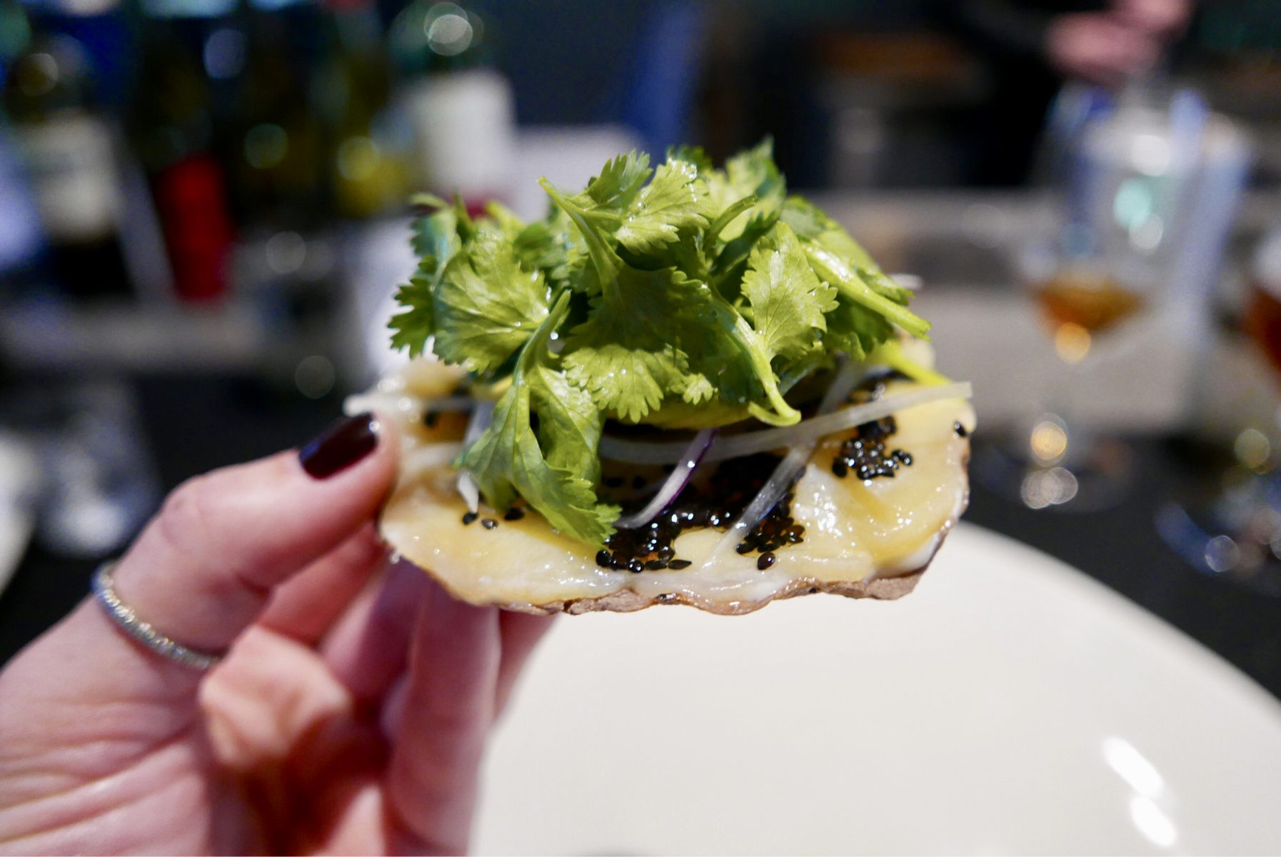 Taco omakase by Enrique Olvera at Pujol, Mexico City (Callo de hacha tostada in the picture)