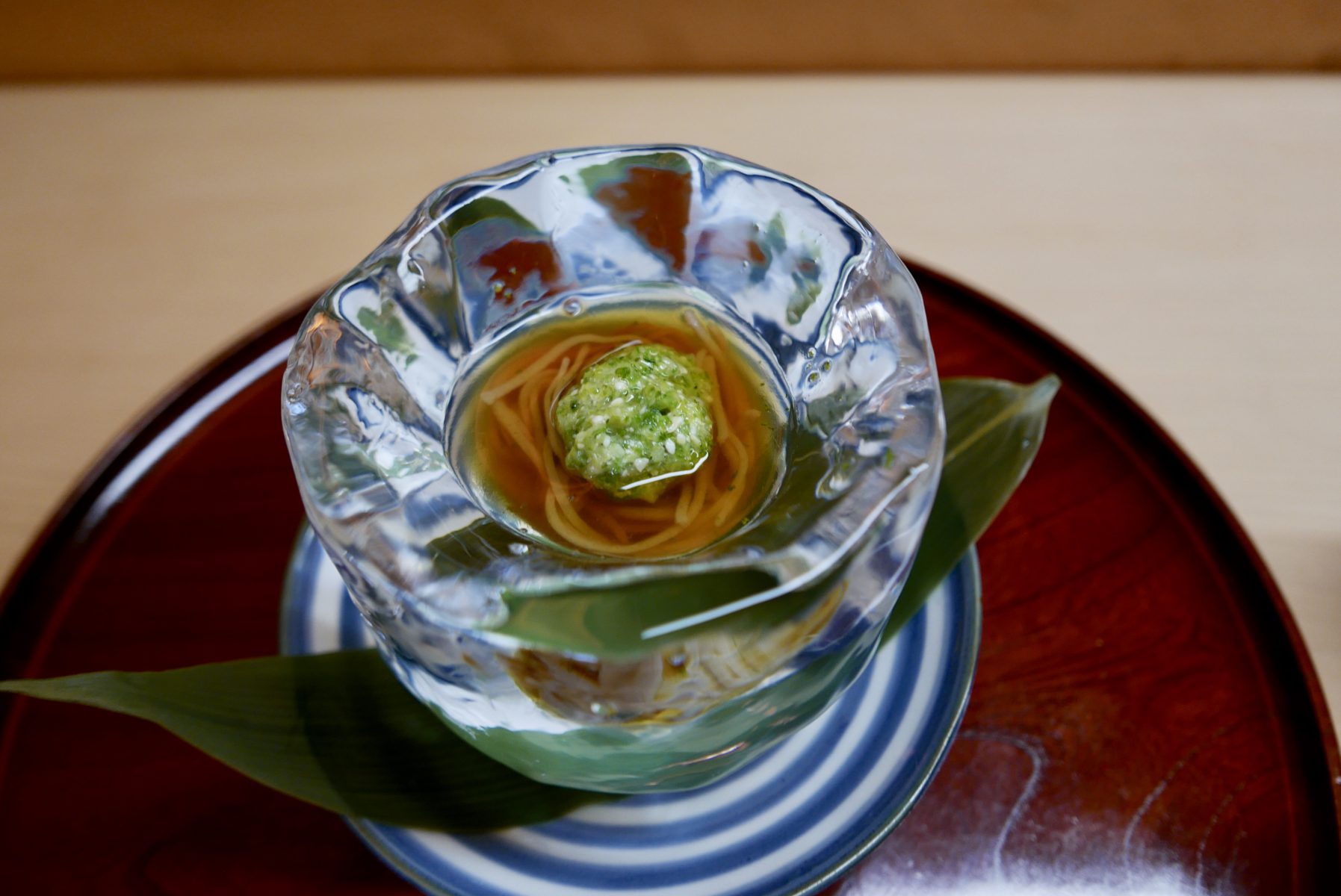 Soba with okra in a hand carved ice bowl at introduction only Matsukawa,Tokyo