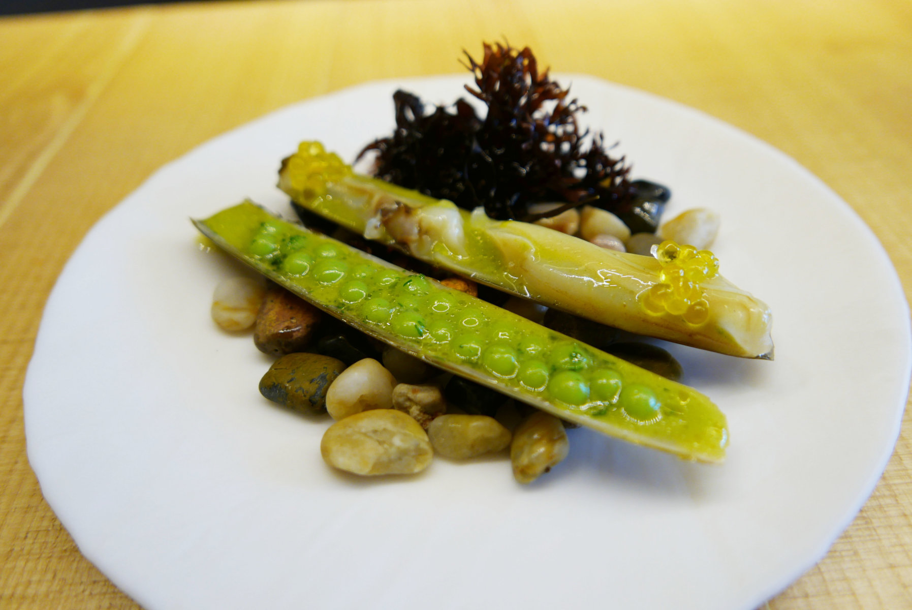 Razor clams with peas in "salsa verde"