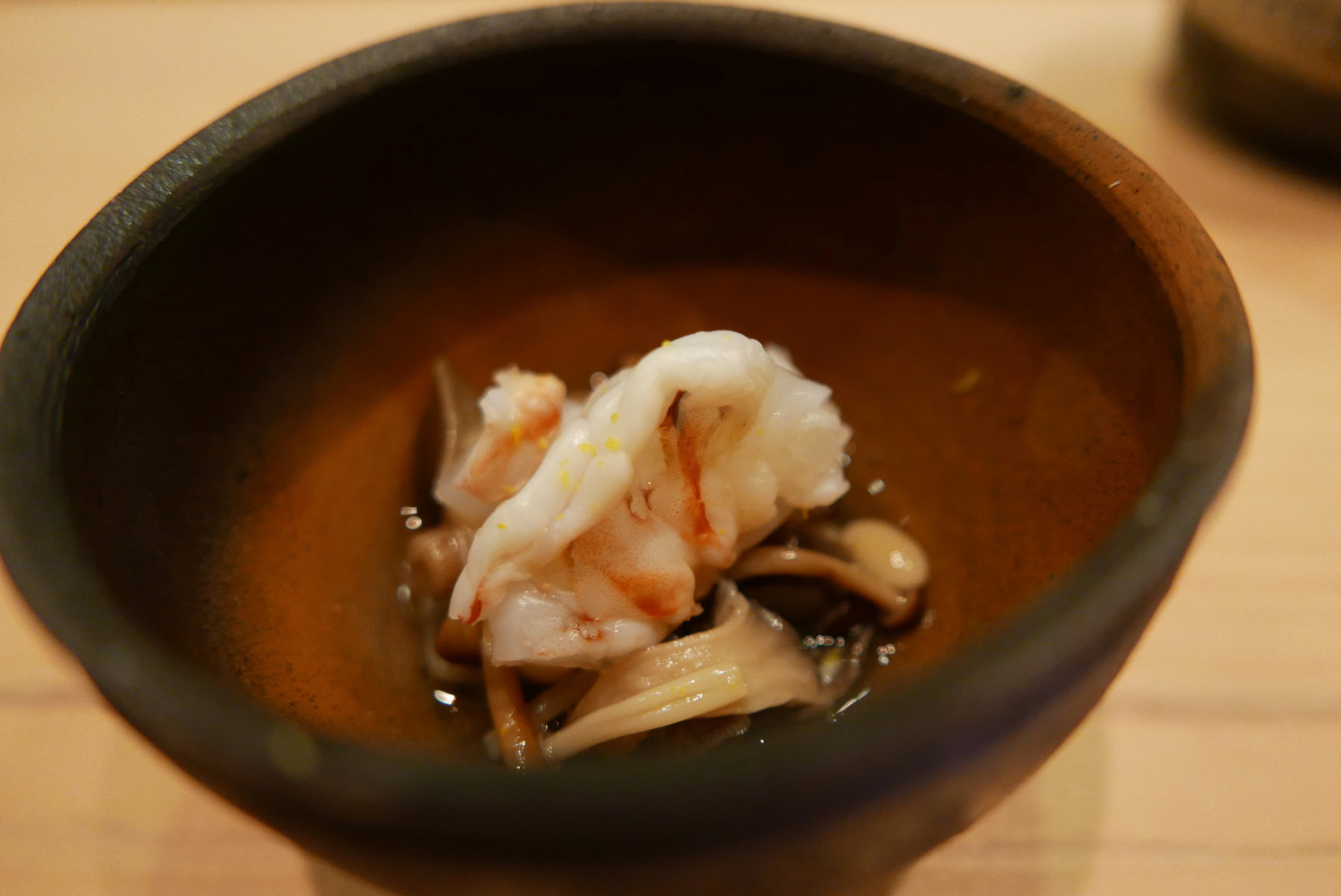 Seared Japanese tiger prawn with 7 kinds of Japanese mushrooms and yuzu zest