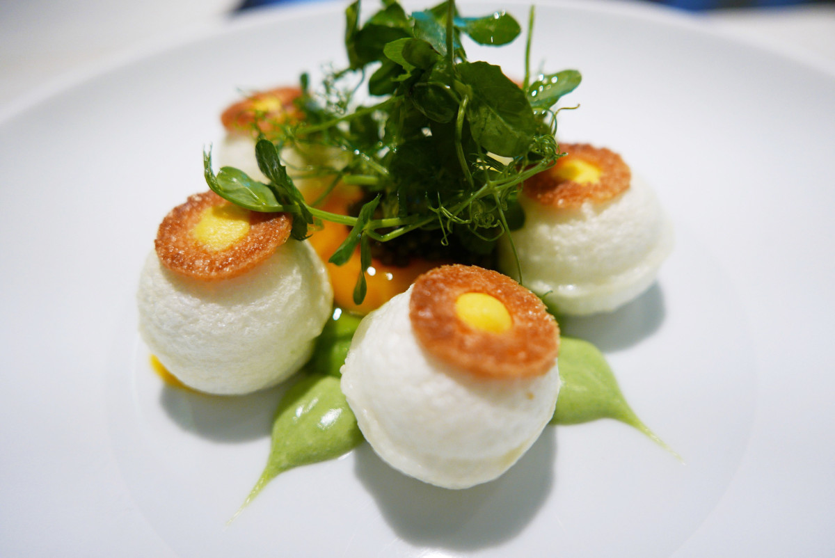 “Blanc-manger” with green peas, herbs, runny egg and caviar by Pacaud