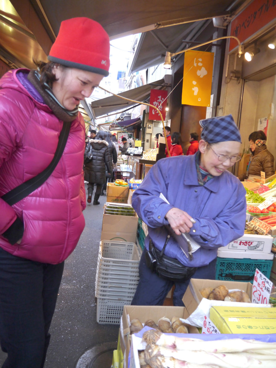 Yukari at a produce vendor at Tsukiji.