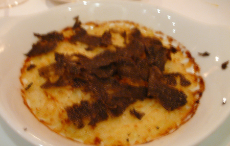 Onions gratin with black truffles 