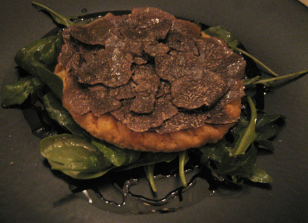 Pizza with black truffles