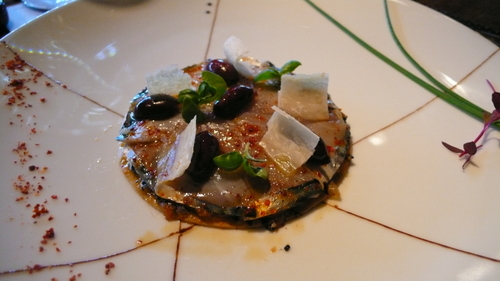 Fresh mackerel on thin tart with parmesan shavings and olives