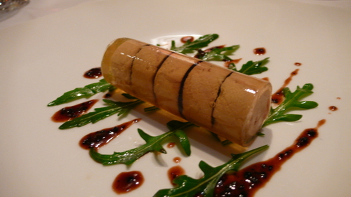 Foie gras cigar with black truffles in Sauternes jelly