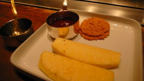 Ananas flambé with tequila and coconut ice cream