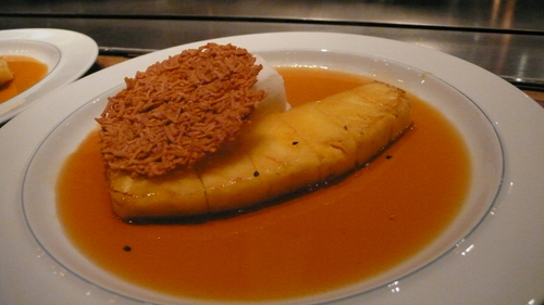 Ananas flambé with tequila and coconut ice cream