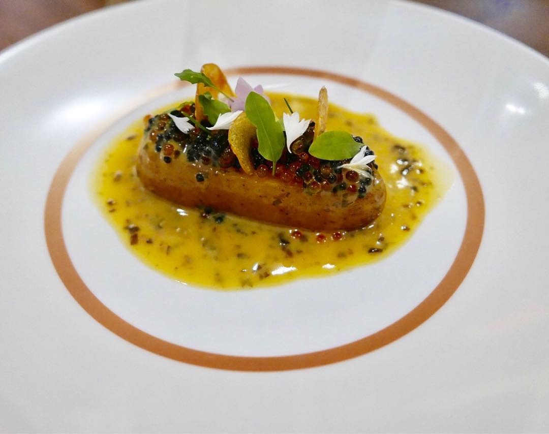 Charlotte potato with dulse beurre blanc, herring and trout roe