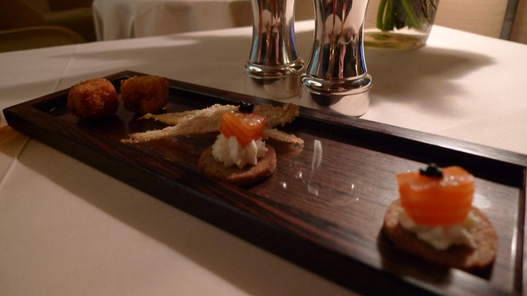 salmon canapés and cheese crisps for amuse-bouche