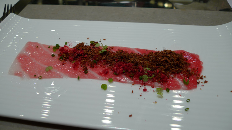 Toro, foie gras powder, freeze fried raspberry