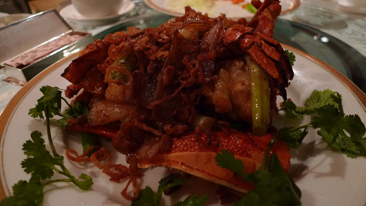 stir-fried fresh lobster with spring onion, red onion and shallots