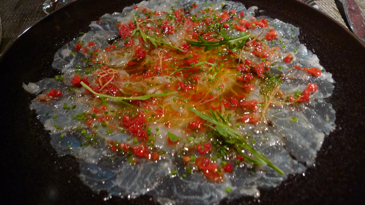 Sea bream carpaccio with preserved tomatoes...