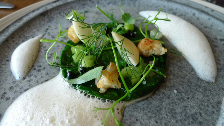 Steamed spinach and tea, cooked onions and celery