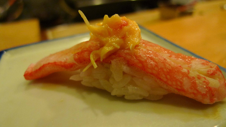 Crab with some horse radish on the top