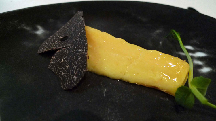 36 months Comté cheese with a slice of black truffle.