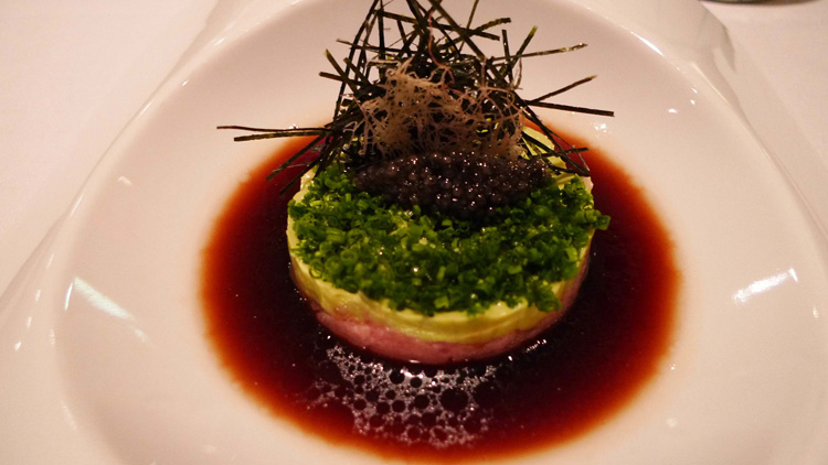 chutoro tartare with avocado coulis, garnished with caviar, chive, served in sesame ponzu sauce
