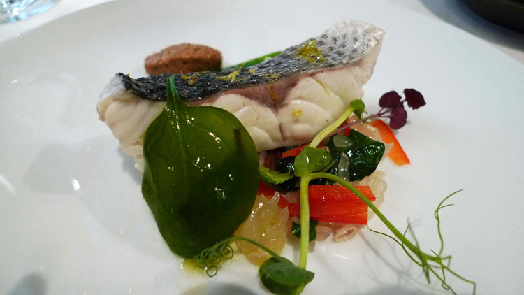Sea bass with pomelo, coconut, red peppers and razor clams on the side