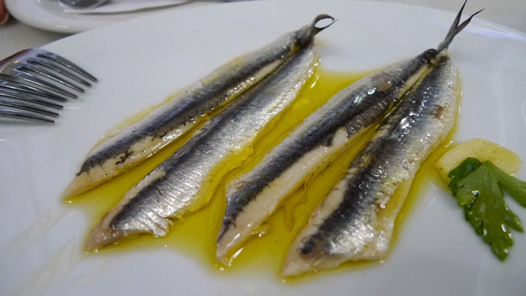 Anchovies in vinegar . Amazing, i didn't know that anchovies could be that good.