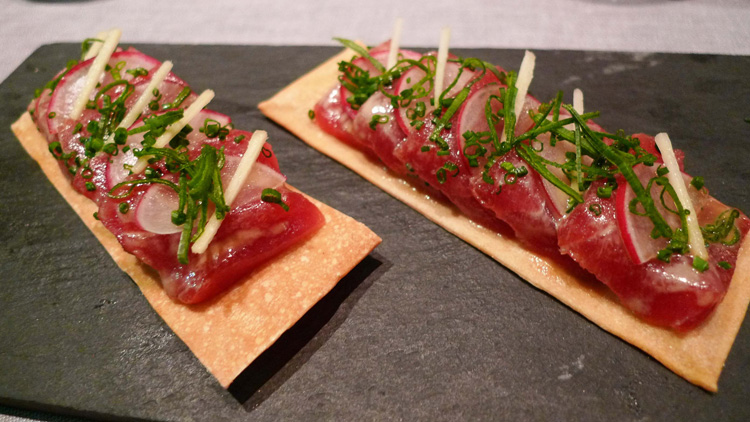 Pizza- sashimi- tuna sashimi on a cracker.