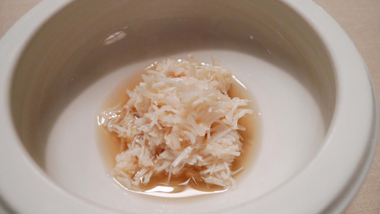 Silky bread stew, infused with pink geranium leaves covered with crab meat