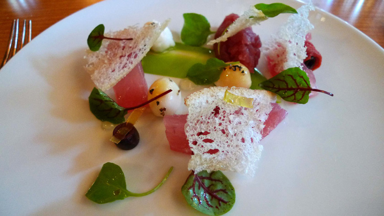 Tuna tartare with sorrel, tomato an olives