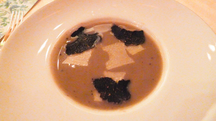 Artichoke and black truffle soup,layered brioche with mushrooms and truffles
