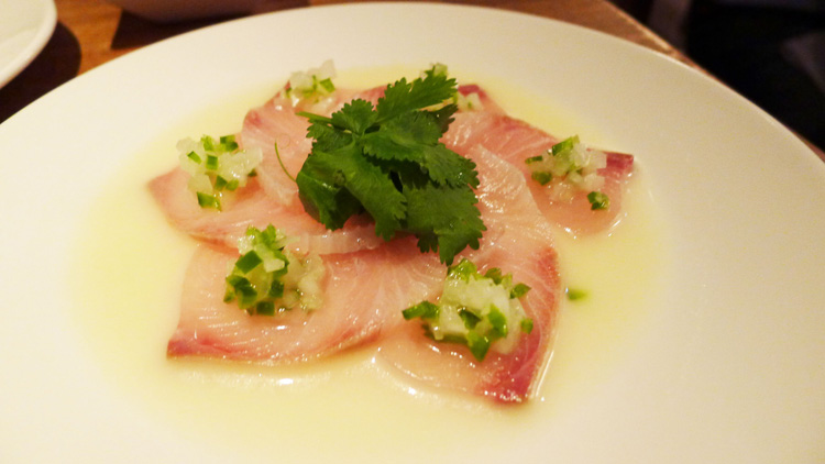 Yellow tail sashimi with jalapeno salsa and yuzu garlic sauce 